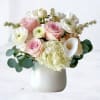 A delicate harmony of soft blush and creamy white blooms, the Blush