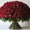 Classic roses reimagined in a full, luxurious arrangement that celebrates love without