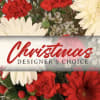 A seasonal holiday arrangement created with the freshest flowers that day. Our