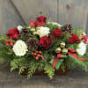 Flowers included in this design are Roses, Lisianthus, Coffee berry, Pine cones