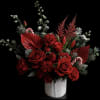 Exquisite Holiday Surprise 
A rich reds, winter greenery, frosted textures, and candy-cane