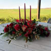 A beautiful triple taper candle centerpiece for your holiday gift giving. 