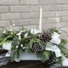 A long beautiful Christmas centerpiece, we have added a selection of winter