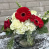 A lovely fresh Christmas arrangement with roses and Gerbera daisies, we have