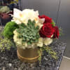A Rich Low and Lush Arrangement in a Gold Hat box paired