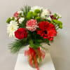 This Medium Tall Arrangement Incudes Christmas Greens, Red Gerbera Daisies, White Gerbera