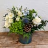 Send a frosty winter arrangement perfect for any occasion. This arrangement is