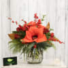 Perfect for a dining table or end table, this arrangement features evergreens