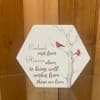 Cardinal Wishes is a small wooden plaque. Engraved with the saying "Cardinals
