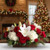 Brighten the heart of your holiday table with this glowing centerpiece. Featuring