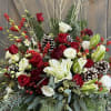 This lush and opulent arrangement will be the show stopper to any