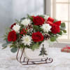 EXCLUSIVE Send holiday joy their way! Our dashing arrangement features classic Christmas-colored