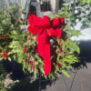Beautiful fresh mixed evergreen pine wreaths decorated with a bow of your