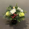 An assortment of Limonada roses, white mums and red berries with long