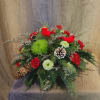 This festive winter centerpiece brings an earthy, rustic feel to your table