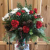 When thinking of a great gift, send our Holiday Happiness vased arrangement.