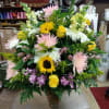 One sided sympathy fresh includes, snap dragons, yellow roses, solidago, purple alstromaria