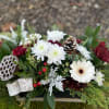 Low profile holiday centerpiece .  Mix of  red and white
