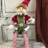 This adorable elf has wired limbs so that he can easily be