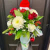 Holiday cheer, in the cup they&rsquo;ll use all year!

This festive floral arrangement