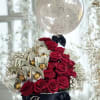 Arrangement of red roses, Ferrero Rocher, with a bubble balloon and a