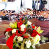 Xmas arrangement in golden cylinder