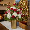 Make a stunning statement with this elegant and luxurious arrangement. Rich red
