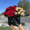 12 Red roses with 12 Ferrero in an elegant box with a