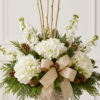 A stunning display of winter sophistication. This elegant, tall arrangement features lush