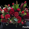 This beautiful box of flowers, filles with roses, lilies, gerbera, tulips in