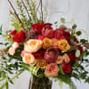 Bold and beautiful, Let It Be showcases roses, garden roses, protea, and