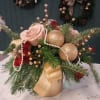 Shimmering with holiday elegance, our Glitter and Gold arrangement brings warmth and