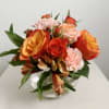 Our Princess Peach arrangement is arranged in a 5" bubble bowl with