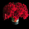 Red Roses on sliced black and white marble vase and foliage.