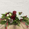 This red pillar centerpiece in wood box keepsake featuring frosted pinecones, plaid