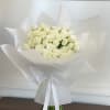 A timeless expression of elegance, the White Grace Bouquet features a lush