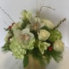 Beautiful mix of white and pale greens.  Hydrangea, roses, orchids and