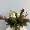 A festive Holiday Centerpiece for your table! This centerpiece will include a