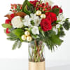Spread joy this holiday season with a shimmering arrangement of roses, alstroemeria