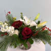 A festive Holiday Centerpiece for your table! This centerpiece will include a
