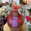 A basket with LAvender, Nutmeg and Chili, and Cardamom hot cocoa mixes.