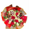 Celebrate the season with this stunning holiday bouquet featuring red roses, creamy