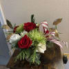 Hydrangeas, roses, spider mums, with holiday greenery, touches of gold leaf and