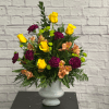 Bright colors in this traditional arrangement is a perfect way to send