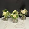 A designer&#039;s choice trio of seasonal budvases. Perfect for sprinkling down a