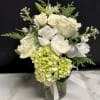 A garden mix with season&#039;s prettiest White &amp; Green blossoms accented with