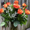 Full Dozen Orange roses in a vase: beautiful! Deluxe provides 24 stems
