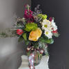 A beautifully selected bunch of the freshest flowers in a vase uniquely