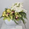 Elevate your holiday d&eacute;cor with the Golden Orchid Holiday Luxe Arrangement, a