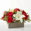 Winter Lily &amp; Rose Centerpiece brings timeless elegance to your holiday season.
Featuring